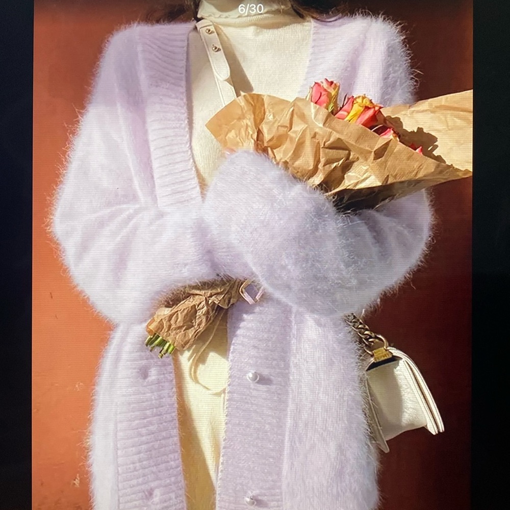 Beautiful elegant and warm one-size Cardigan.